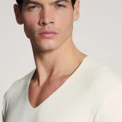Calida 100% Nature T-Shirt Mit Clean Cut, V-Neck, Compostable 11 Calida 100% Nature T-Shirt Mit Clean Cut, V-Neck, Compostable -T-Shirt-Shop Calida 100 Nature T Shirt V Neck weiss 14080 910 1622638791